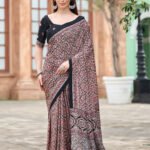 Rose ajrakh print crepe saree with black border and designer pallu