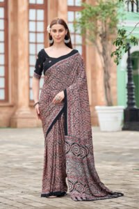 Rose ajrakh print crepe saree with black border and designer pallu